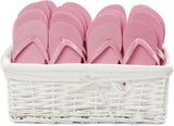 baby pink flip flops in a basket